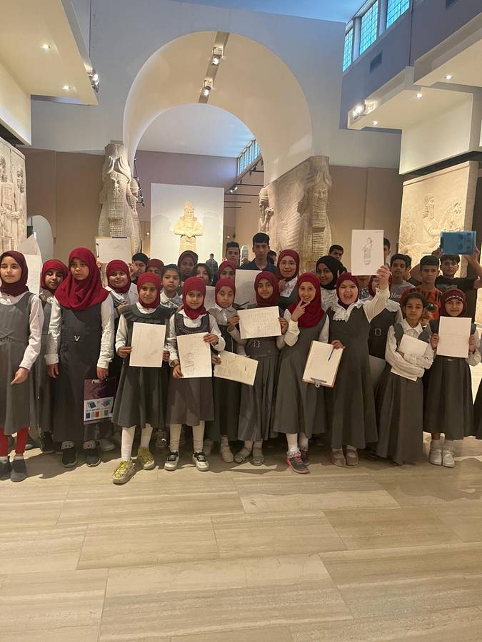 Schoolgirls on their first visit to the Iraq Museum
